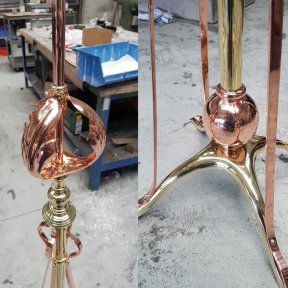 Polished metal standard lamp