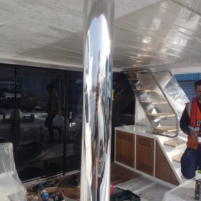 Boat metalwork polished on-site